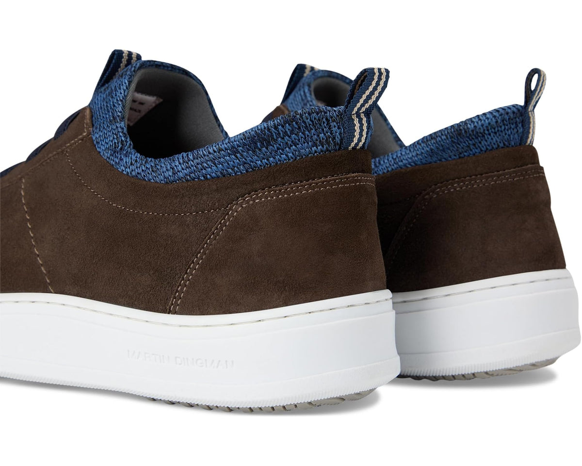 Walnut brown suede sneaker back view with blue knit collar and white sole.