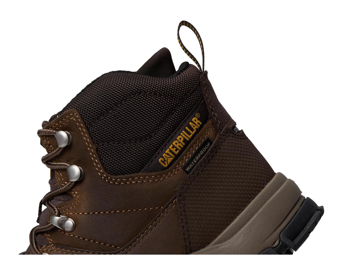 Men's brown hiker boot upper close-up with hook-and-loop strap and side logo