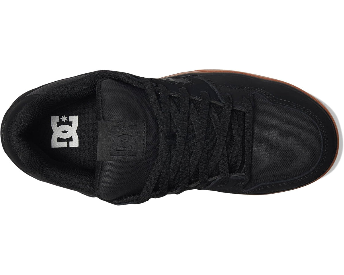 Black lace-up work sneaker interior and treaded outsole view