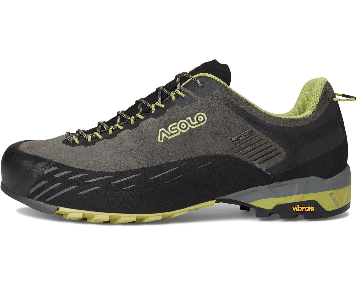 Men's trail shoe side view, dark gray upper, lime laces, Vibram sole