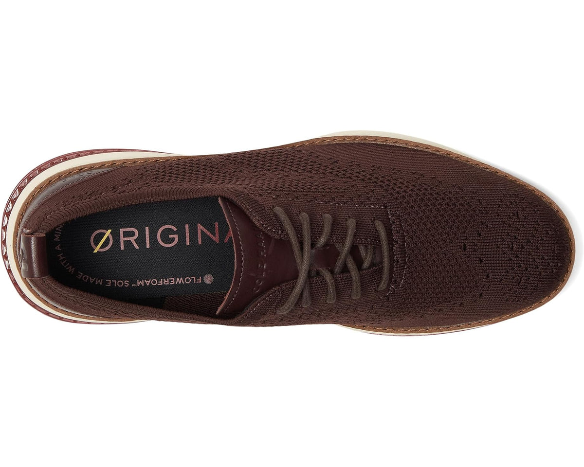 Men's lace-up knit oxford sneaker viewed from side with brown insole and cream outsole edge