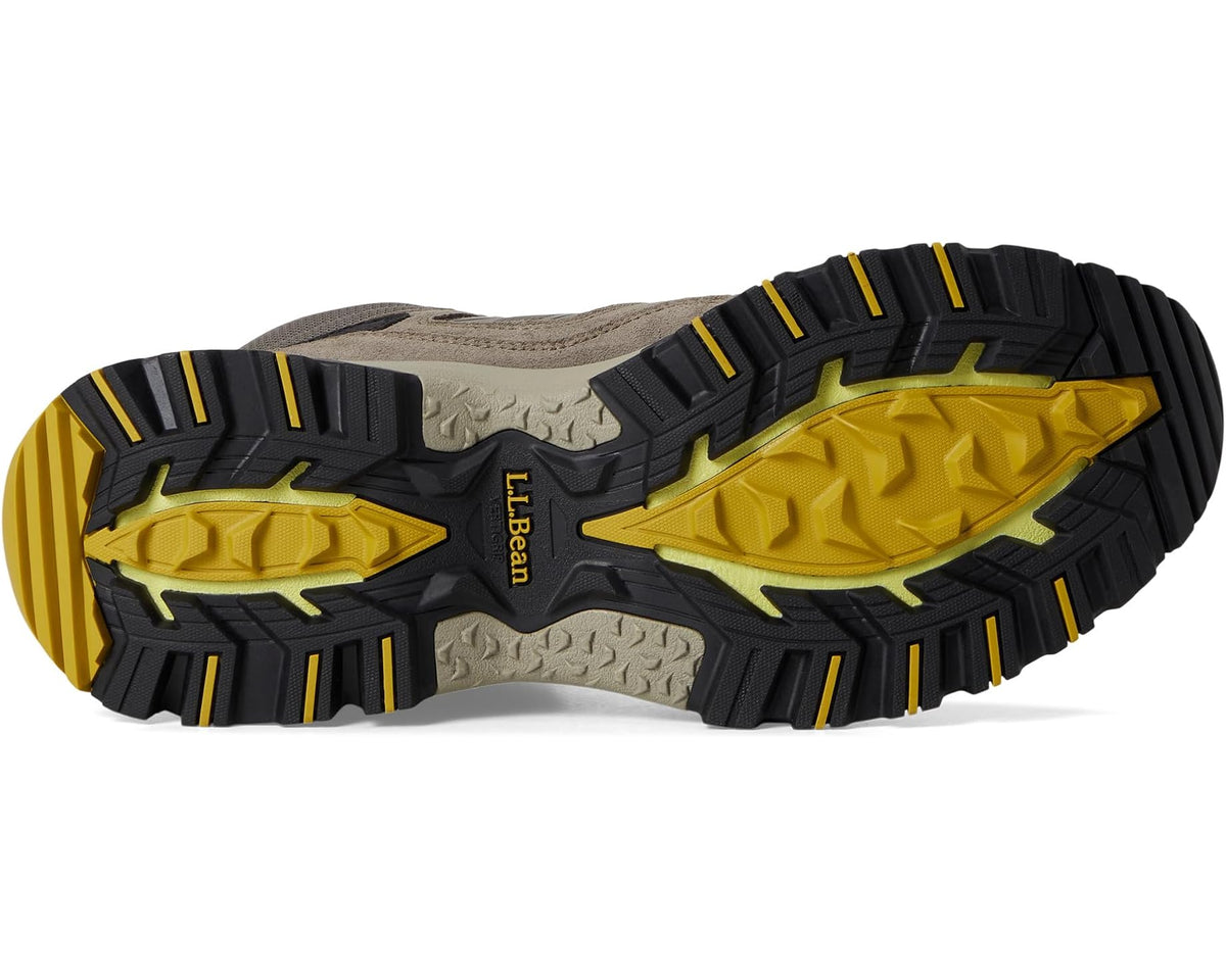 Men's hiker boot outsole with deep tread and yellow traction accents