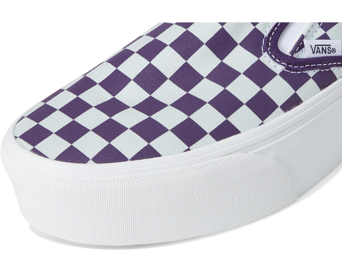 Checkerboard canvas slip-on sneaker upper with purple collar trim and Vans logo