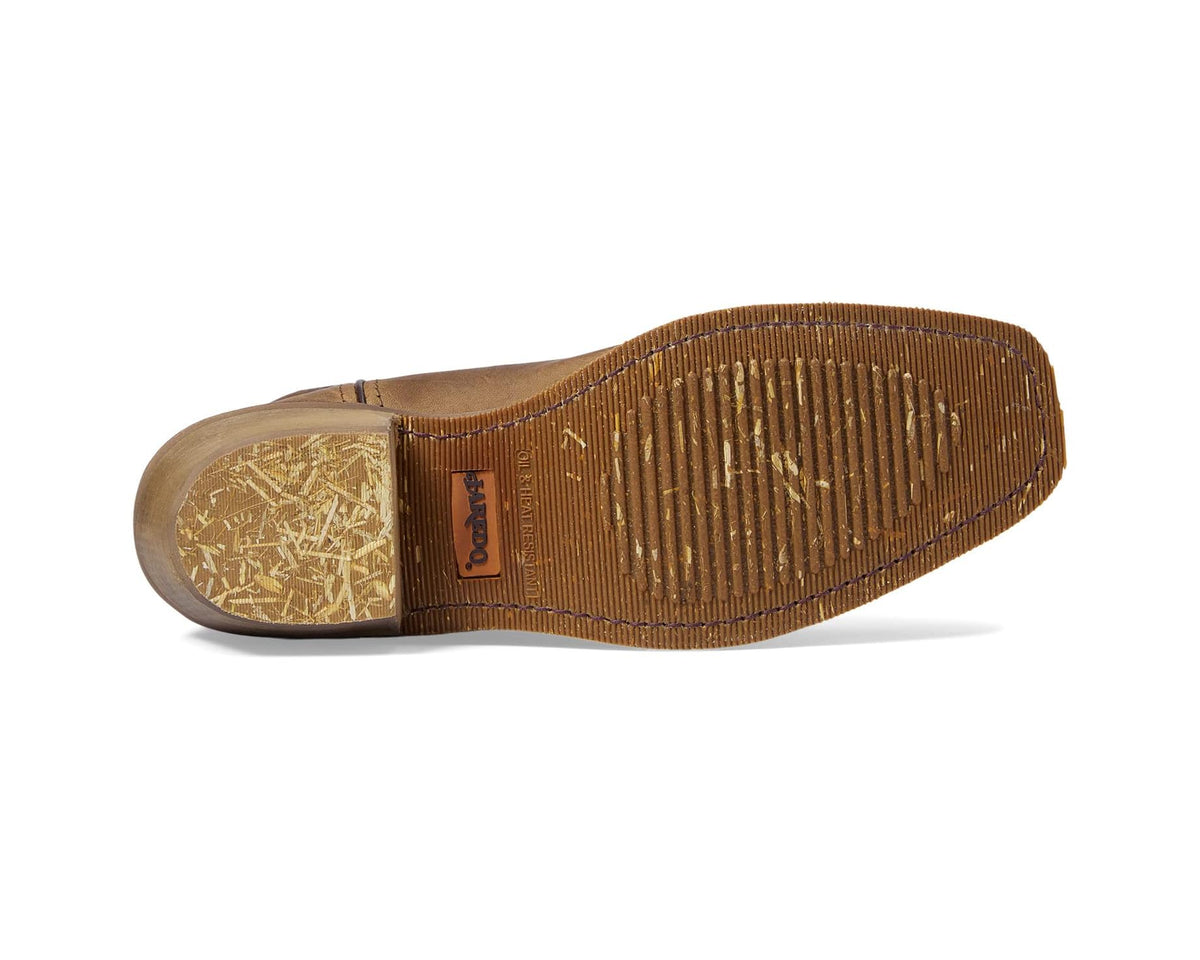 Taupe cowboy boot outsole with tread and side brand patch