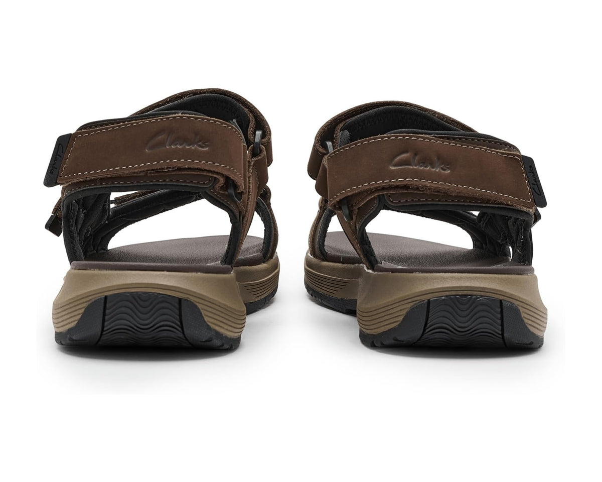 Men's brown leather trekking sandals with adjustable ankle strap and cushioned heel