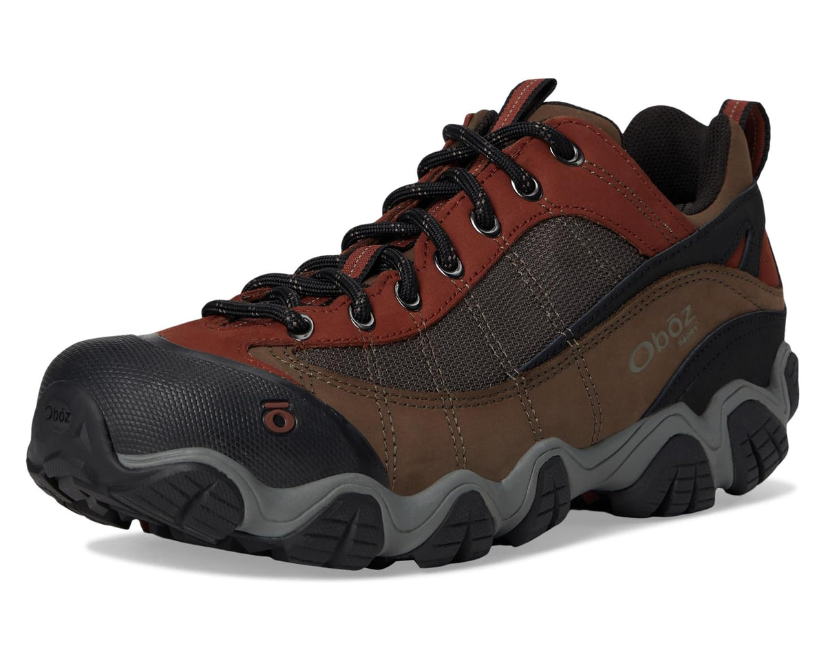 Front three-quarter view hiking shoe in rust, brown, and gray with lace-up design
