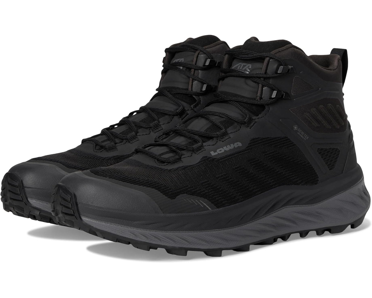 Black mid-cut hiking boot with lace-up closure and chunky tread sole