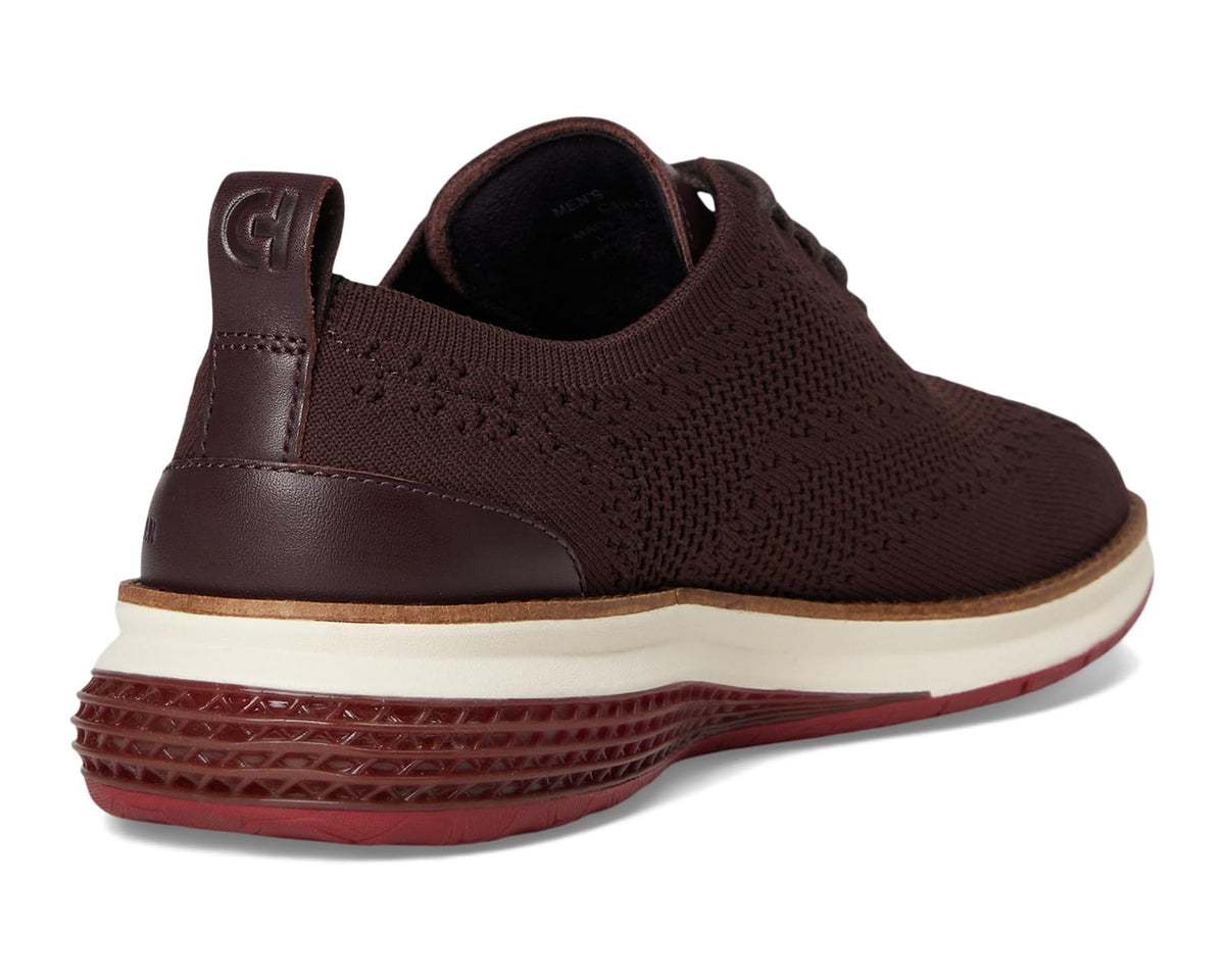 Men's lace-up oxford sneaker heel and side view with dark brown collar and cream midsole