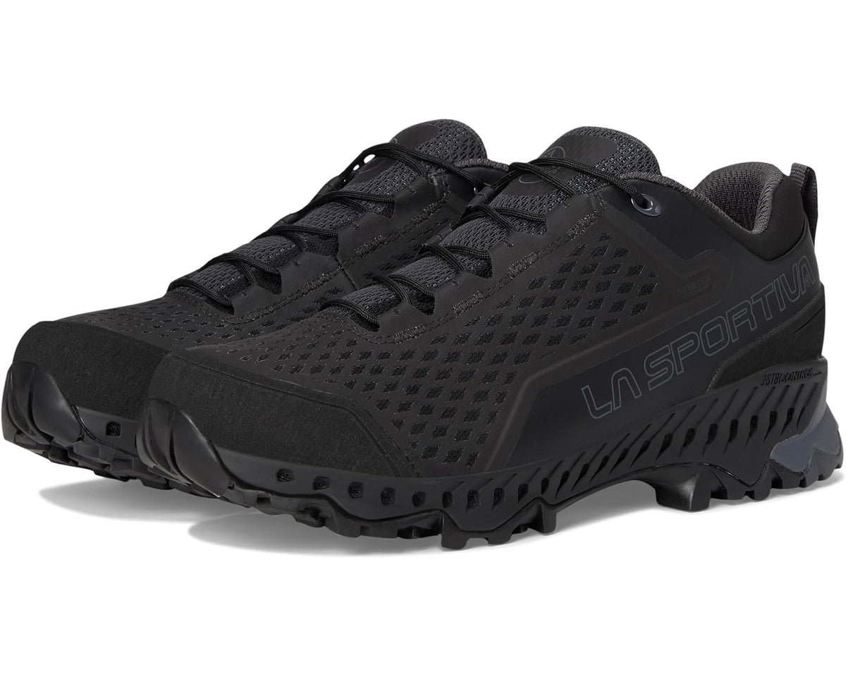 Men's black trail running shoe with black laces and rugged tread sole