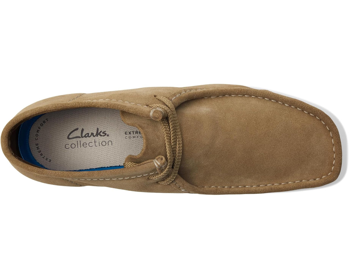 Clarks Shacre suede boot interior view with lace-up opening and logo insole