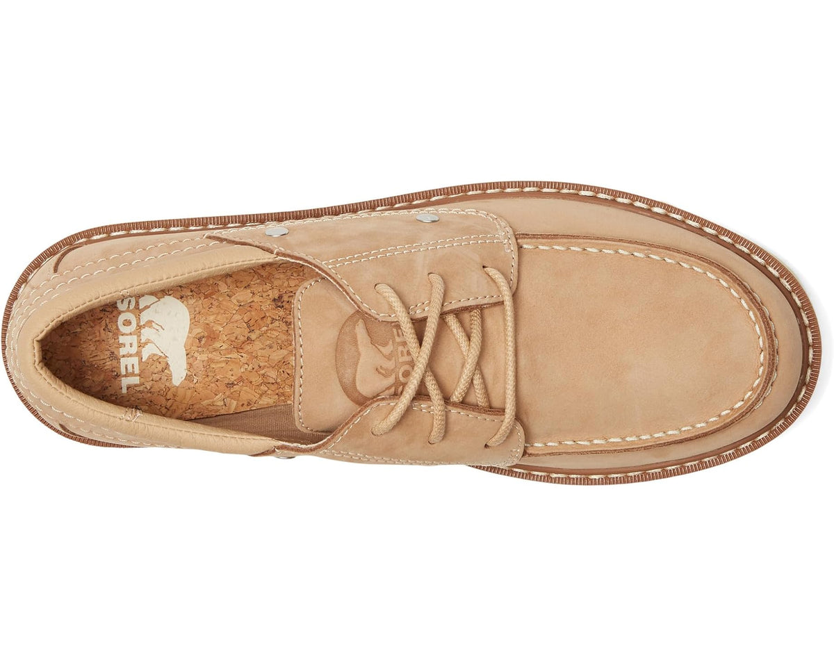 Tan lace-up canoe moc with stitched moc toe, lace-up panel, and cork insole