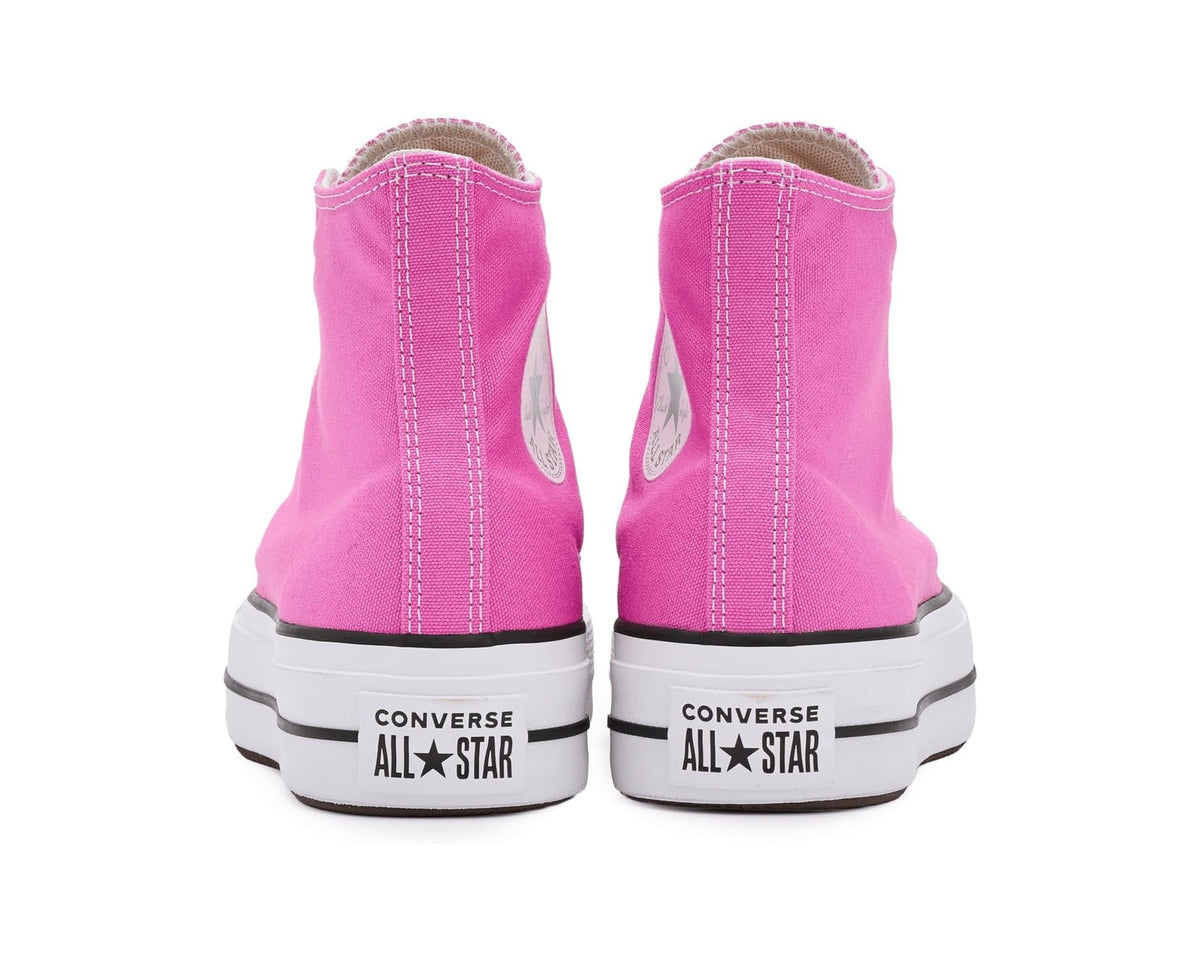 Women's Converse high-top platform sneakers, rear view in shocking orchid with All Star heel text