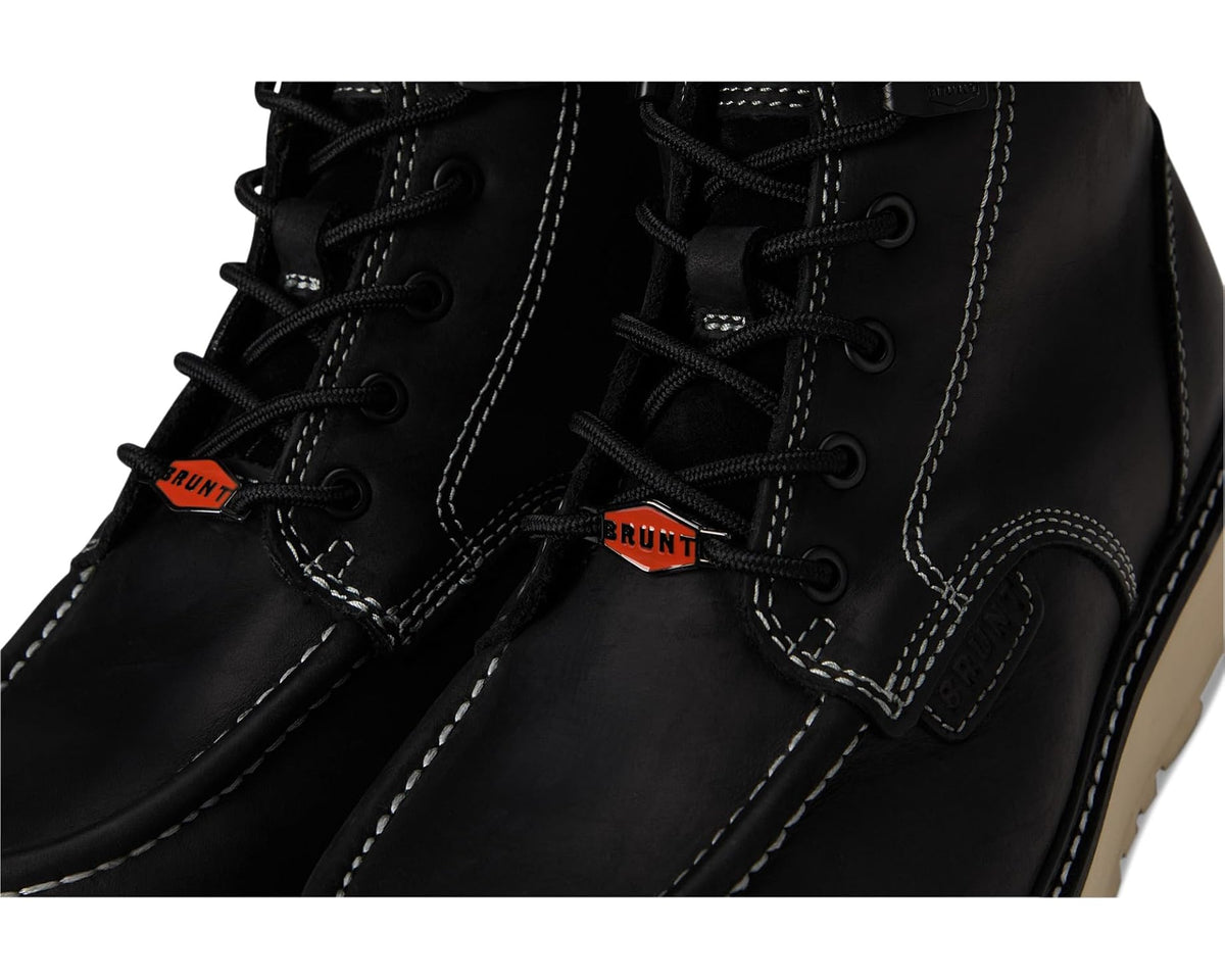Close-up of black laces and stitched side panel with orange BRUNT tags
