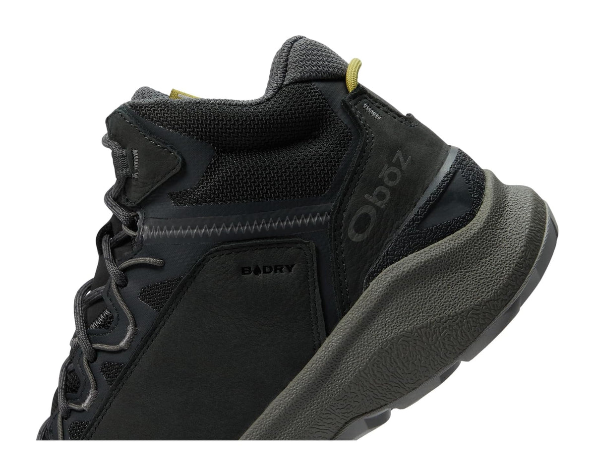 Men's hiking boot upper close-up with B-Dry patch, padded tongue, and lace-up front