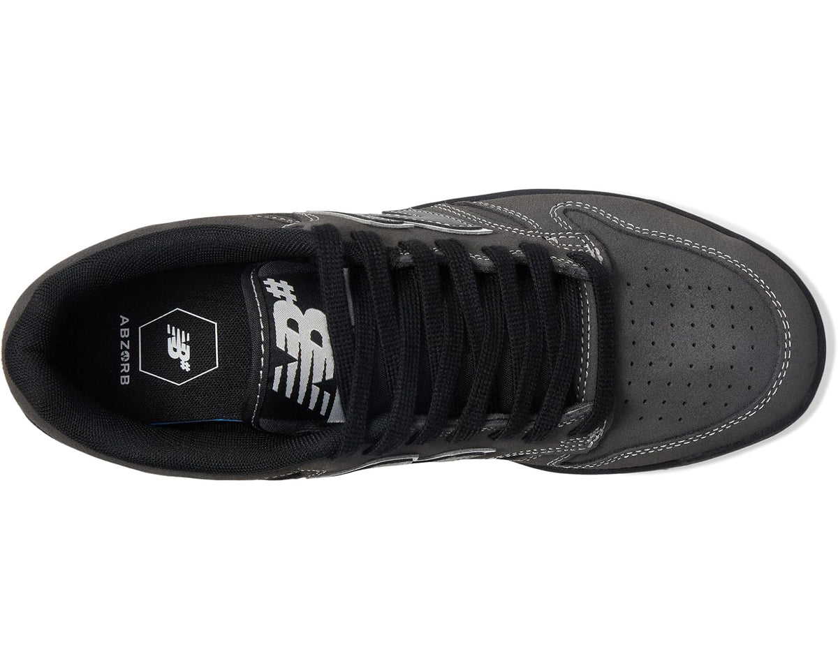 Unisex New Balance 480 low-top sneaker, side view with black laces and mesh tongue