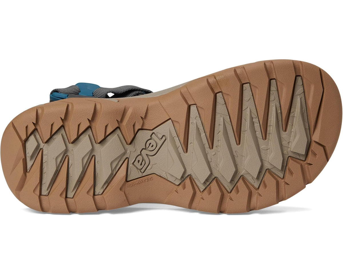 Men's Teva sandal outsole with rugged tan rubber tread and molded grooves