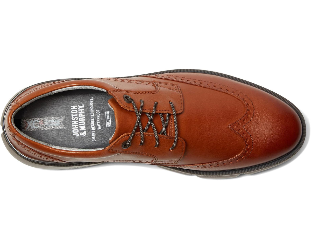 Tan lace-up oxford shoe with side brogue detailing and padded tongue lining