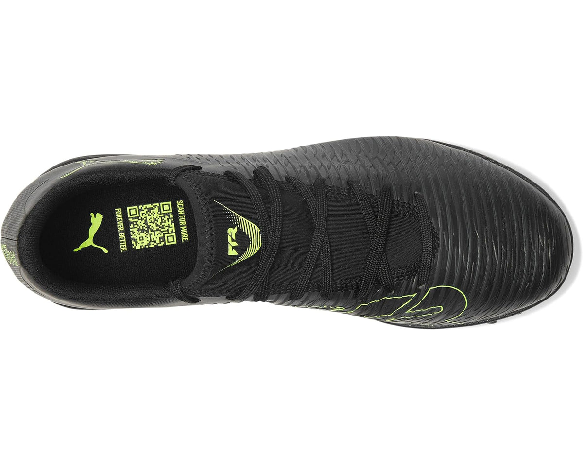 Men's PUMA turf trainer cleat with black knit upper, neon green laces, and heel QR label