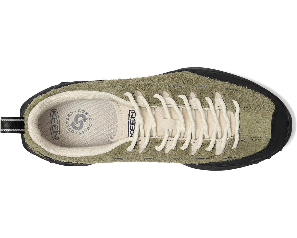 Side view of KEEN lace-up shoe with cream laces, olive suede upper, black outsole