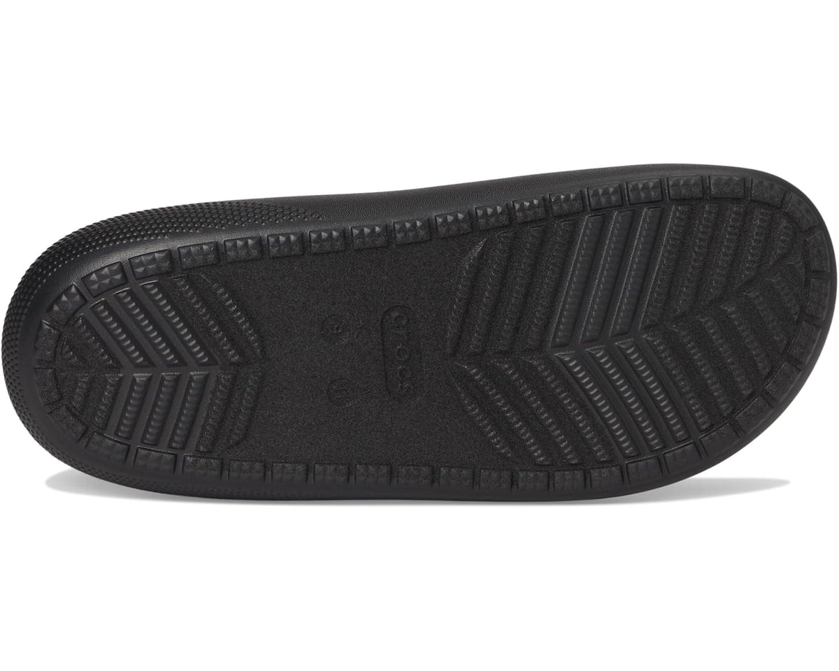 Black rubber outsole with textured herringbone tread pattern