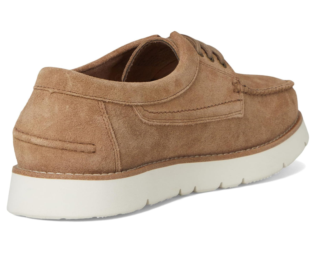 Taupe suede lace-up deck shoe with rounded collar and white rubber sole