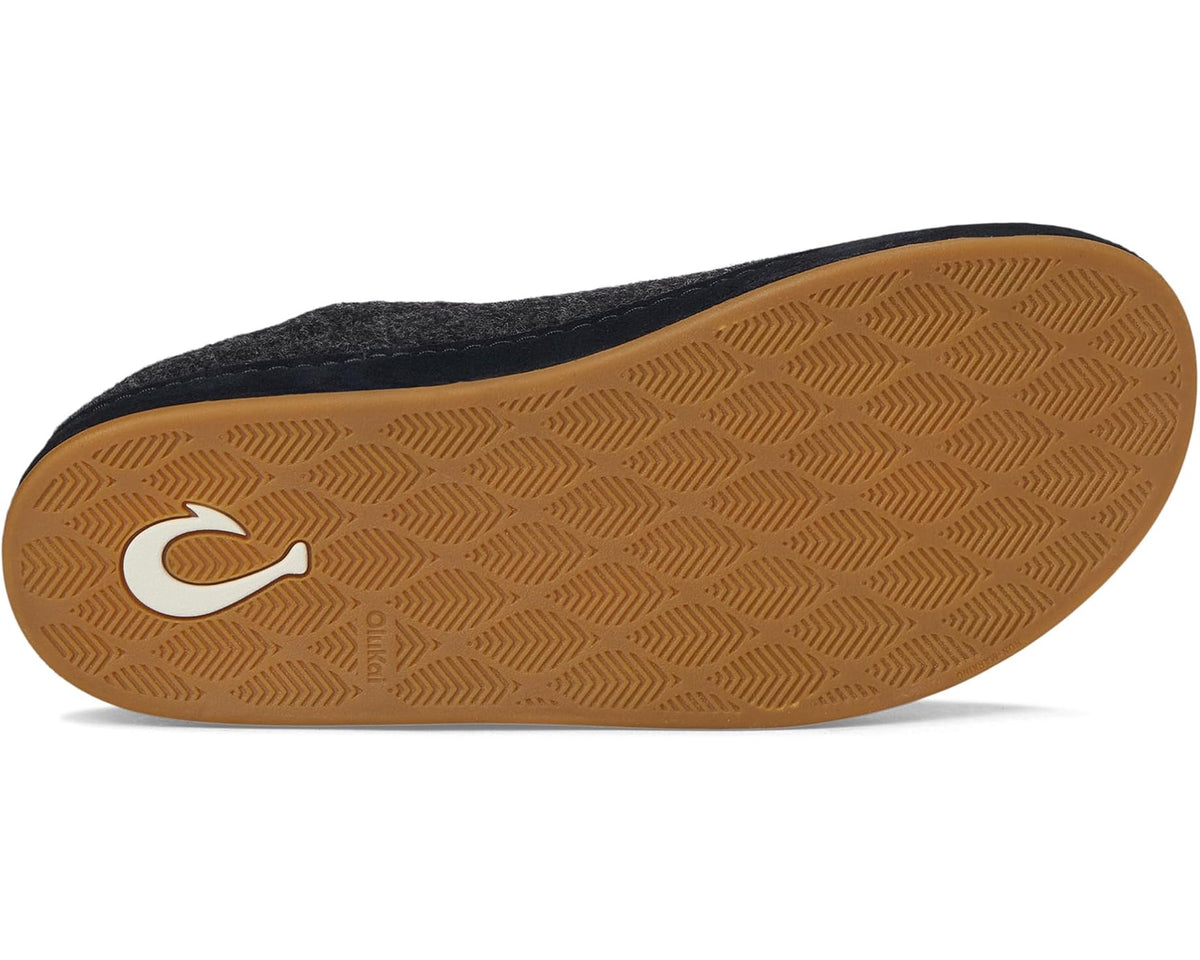 Dark charcoal felt slipper outsole with OluKai logo on tan rubber tread