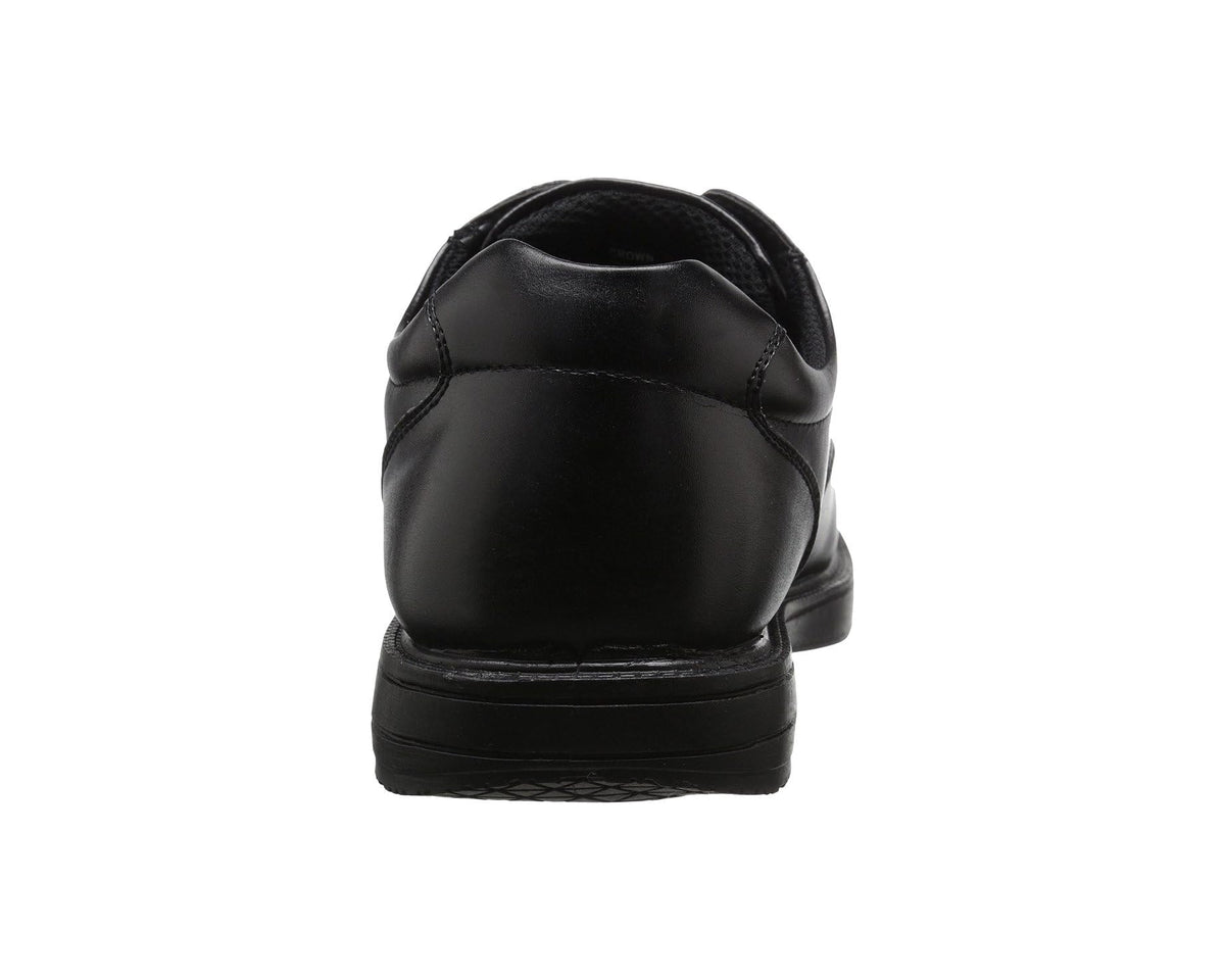 Men's black lace-up dress shoes, rear view with cushioned heel collar