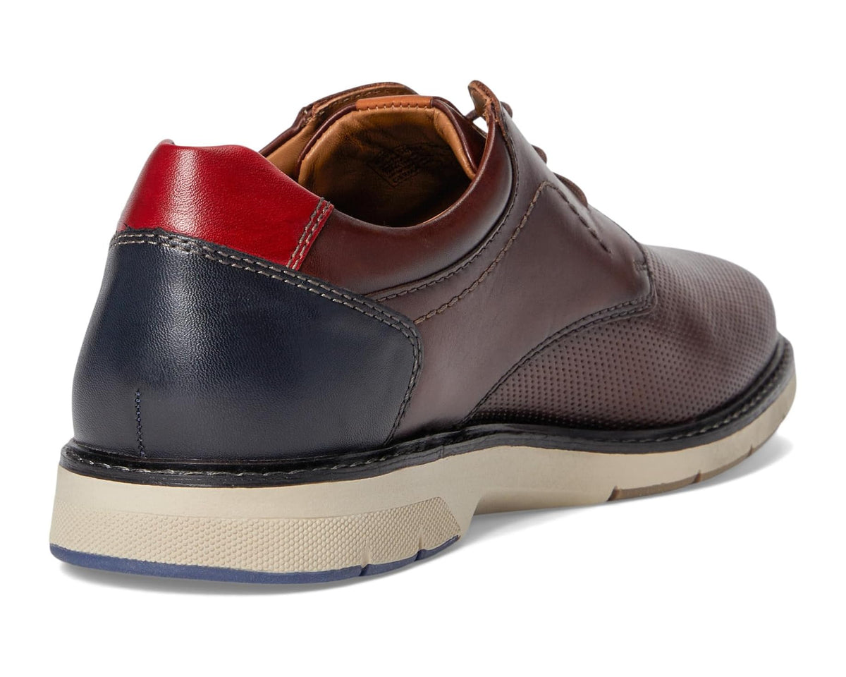 Heel and back view of brown lace-up shoe with red and navy color accents
