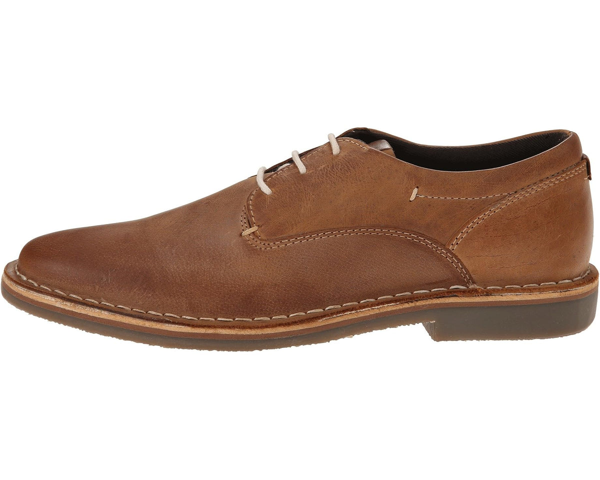 Tan leather lace-up oxford shoe with welt stitching and low-profile sole