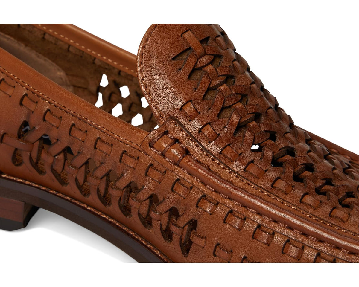 Close-up of cognac brown woven leather loafer upper with detailed stitching
