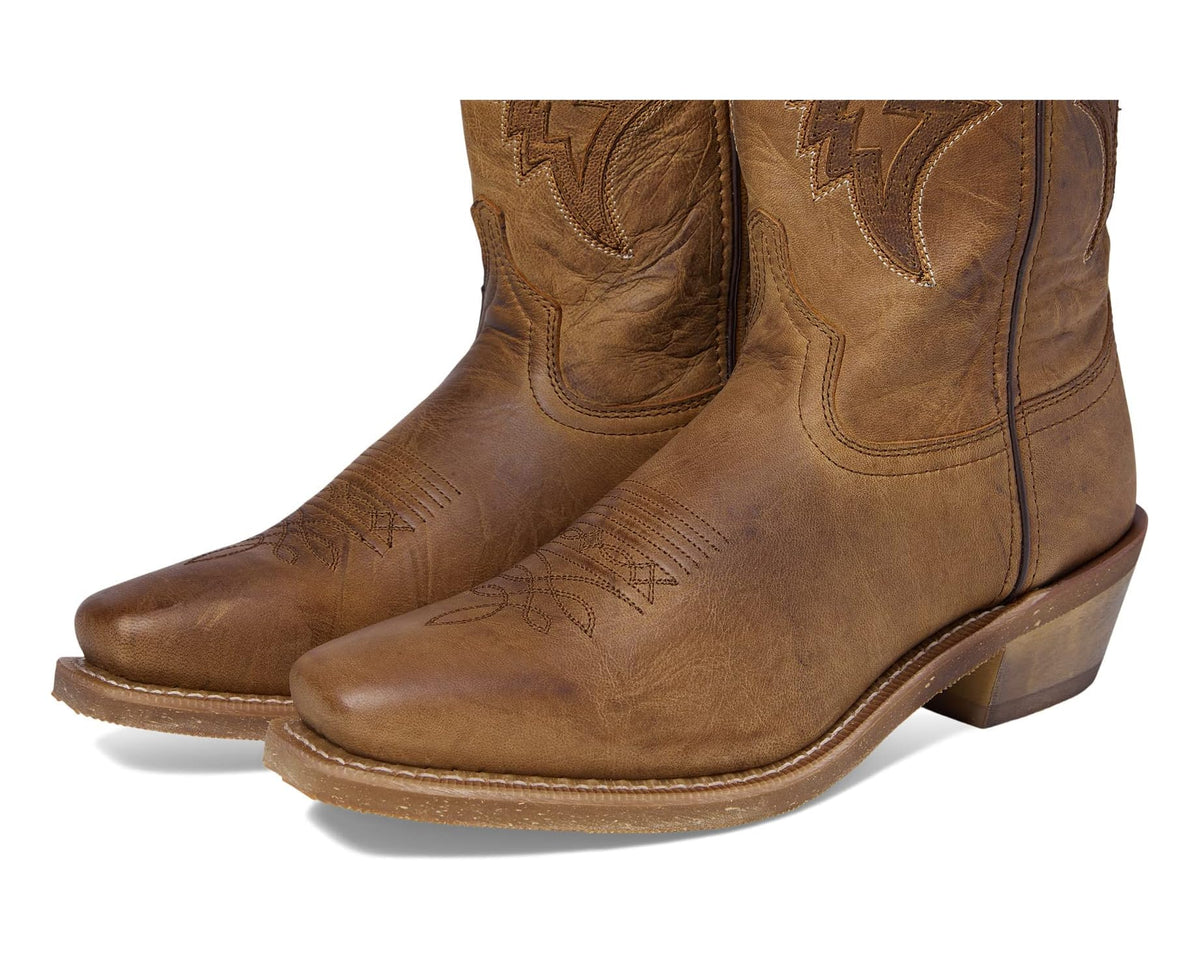 Taupe cowboy boots with stitched panels and western toe detail