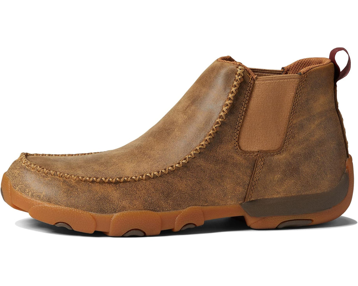 Tan suede ankle boot with round toe, side pull tab, and rope trim