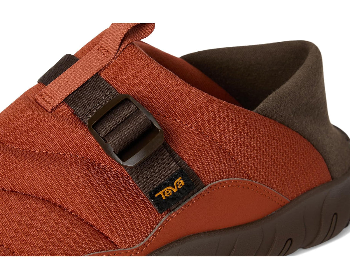 Close-up of cinnamon orange sandal strap and buckle with Teva logo