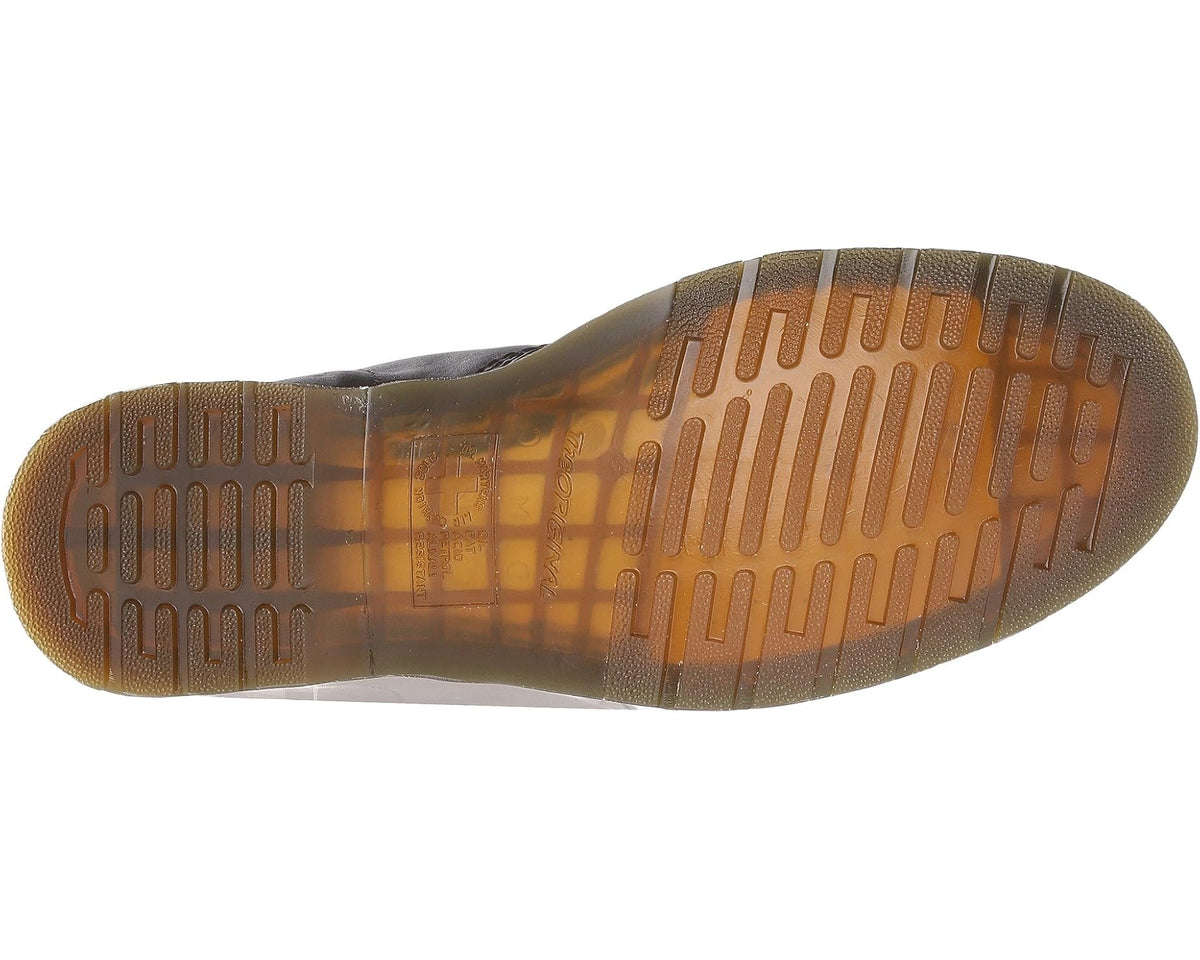 Bottom view of black lace-up ankle boots with textured outsole tread