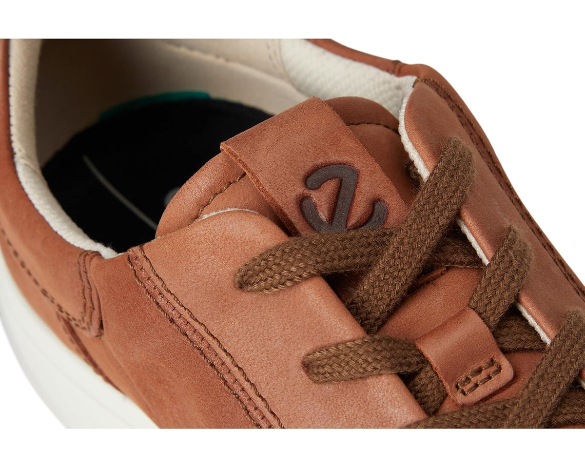 Close-up of mink suede and laces on ECCO tie sneakers with stitched panel details