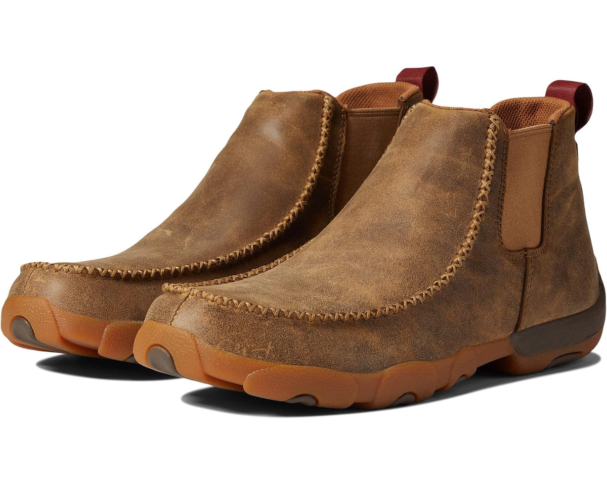 Tan suede ankle boot with side elastic gore and rope-like contrast stitching