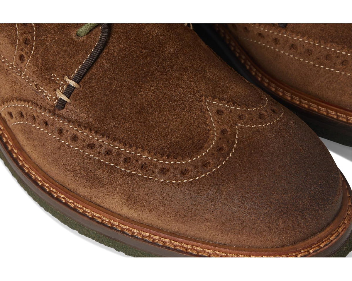 Men's Johnston & Murphy suede wingtip detail, stitched panels with brown sole edge