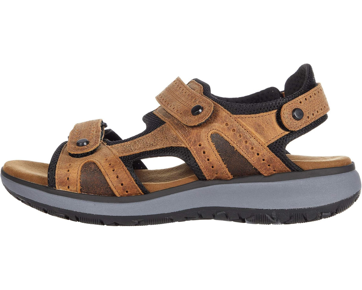 Tan and black sport sandals with Velcro-style straps and molded rubber outsole