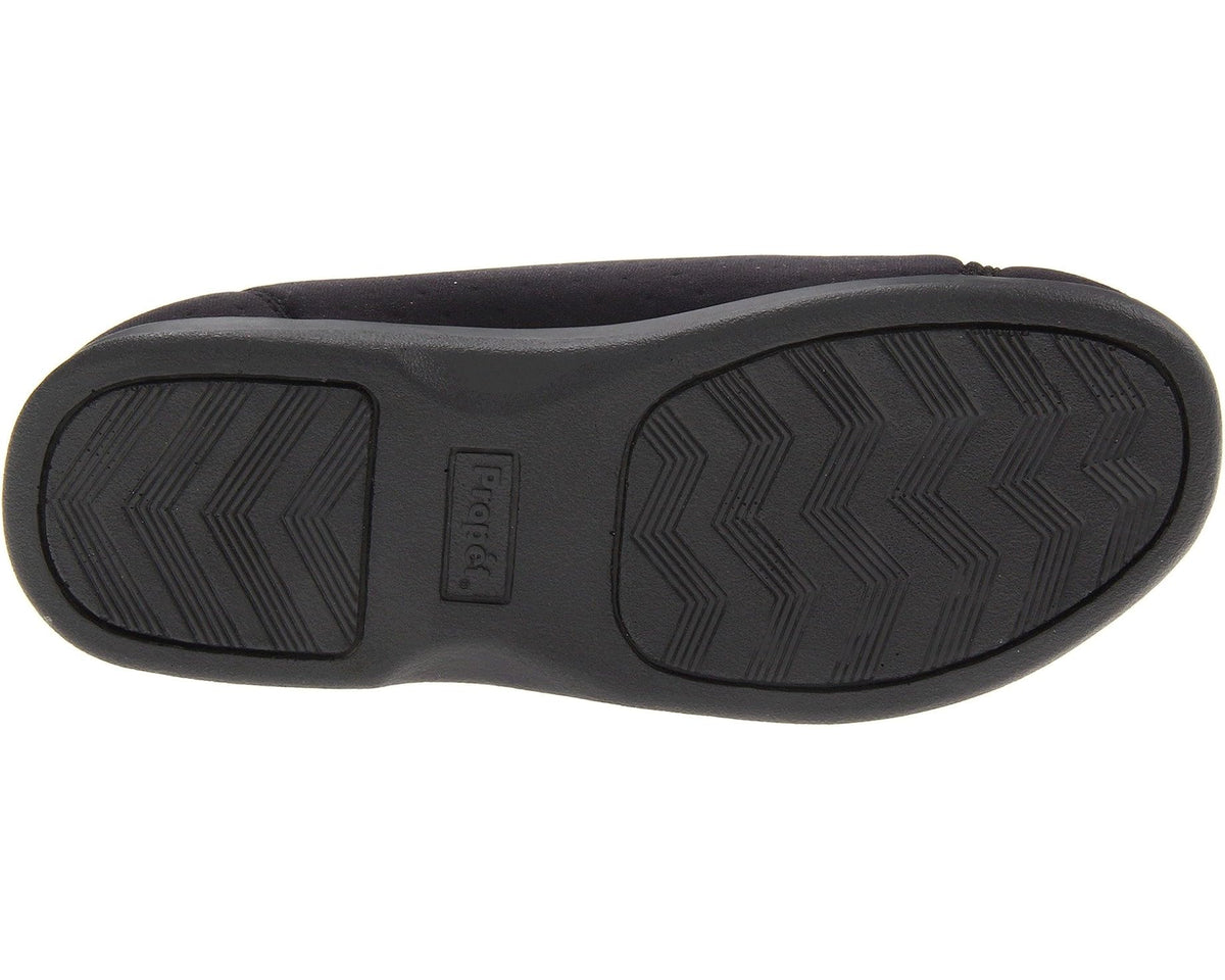 Black rubber outsole with textured tread pattern and Propet logo