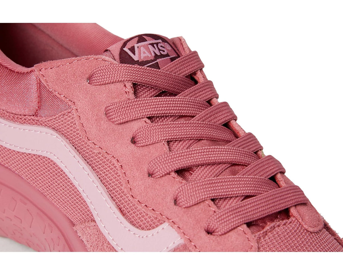 Close-up of mauve lace-up sneaker upper with stitched overlays and lace eyelets