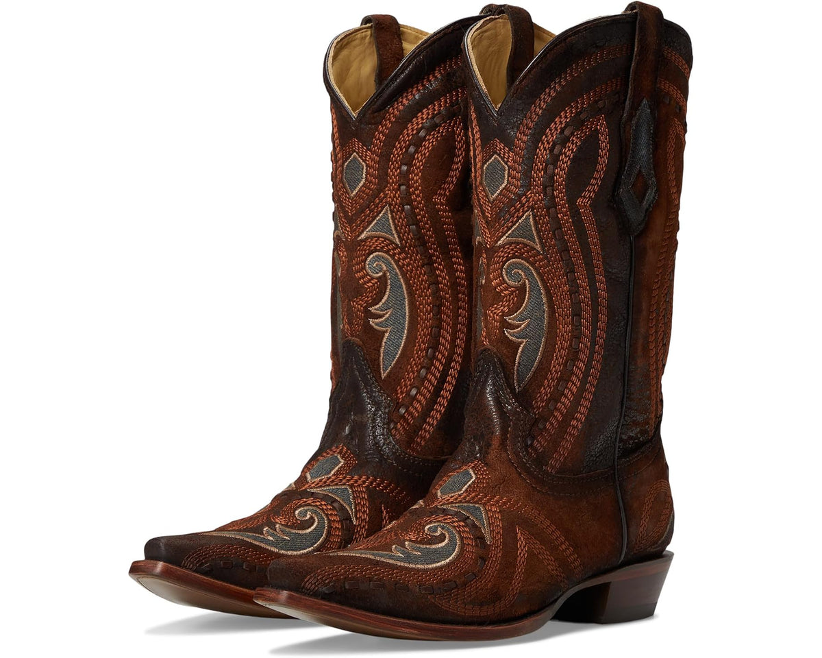 Men's brown Corral cowboy boots with ornate stitched patterns and pointed toe