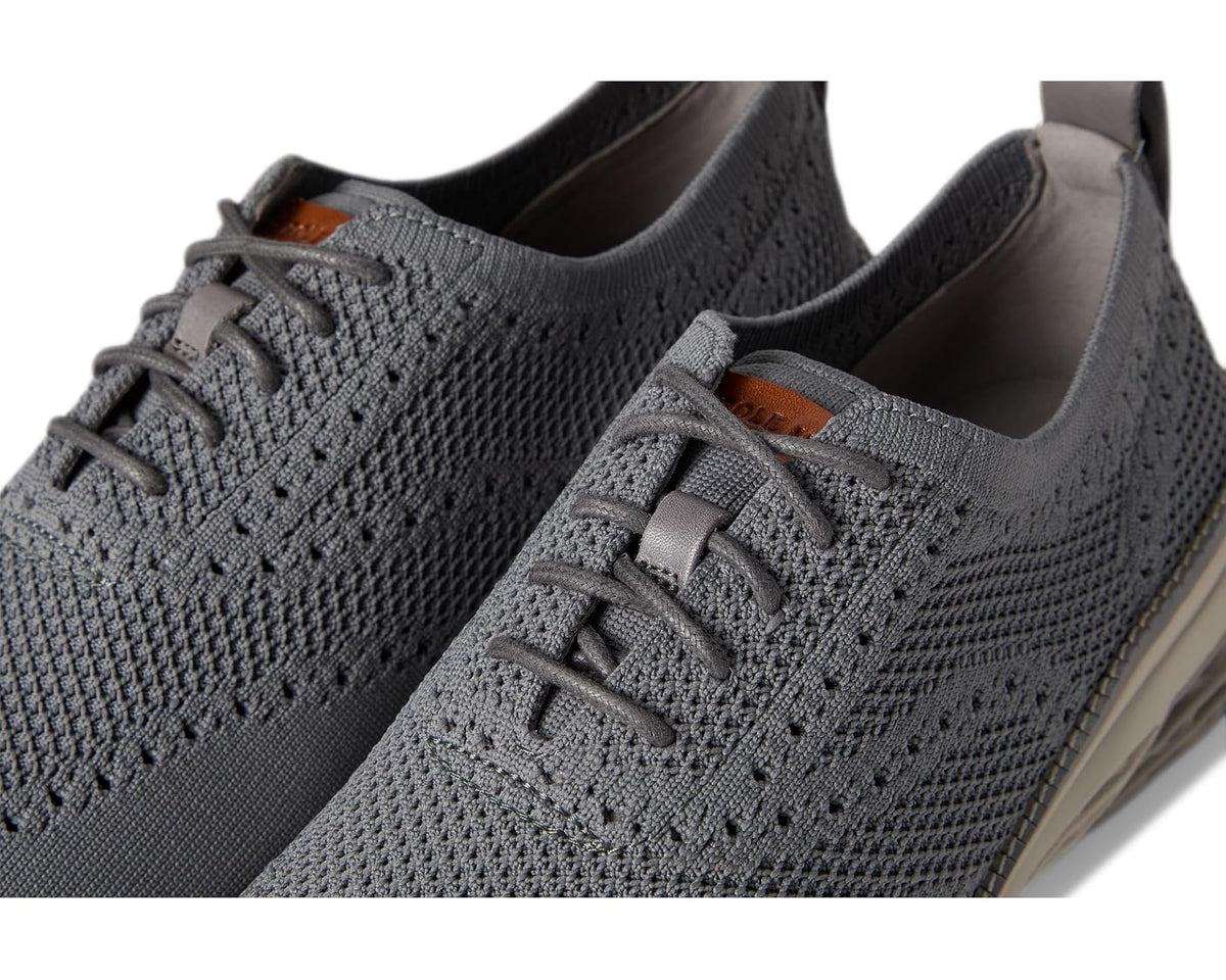 Men's Cole Haan oxford lace-up close-up with gray knit texture and orange lining