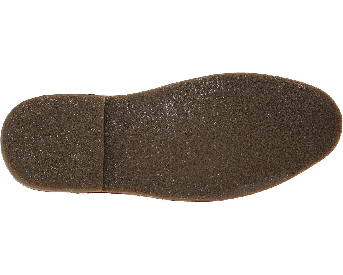 Tan rubber outsole with shallow tread pattern