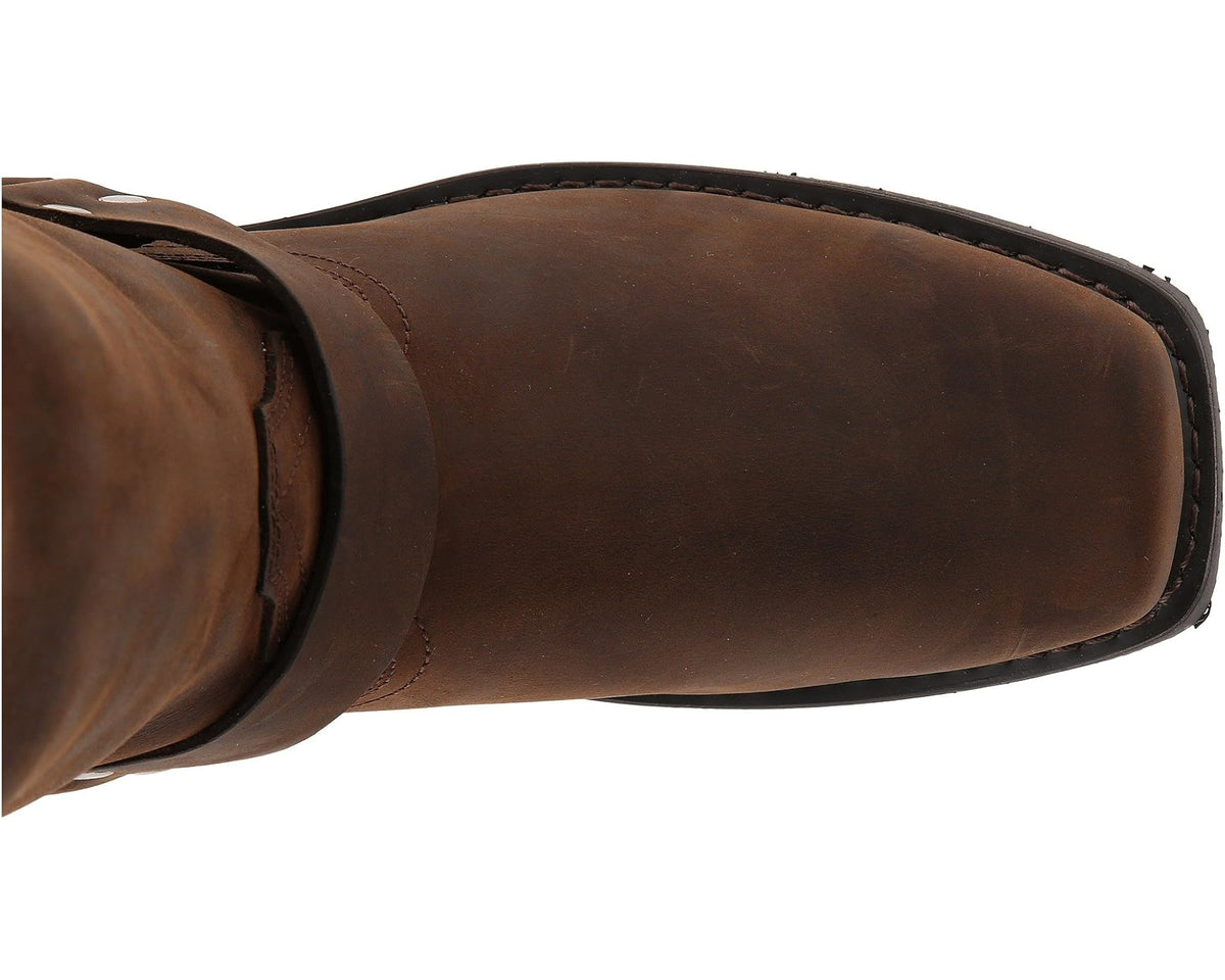 Men's dark brown boot toe and side panel detail with stitched leather finish