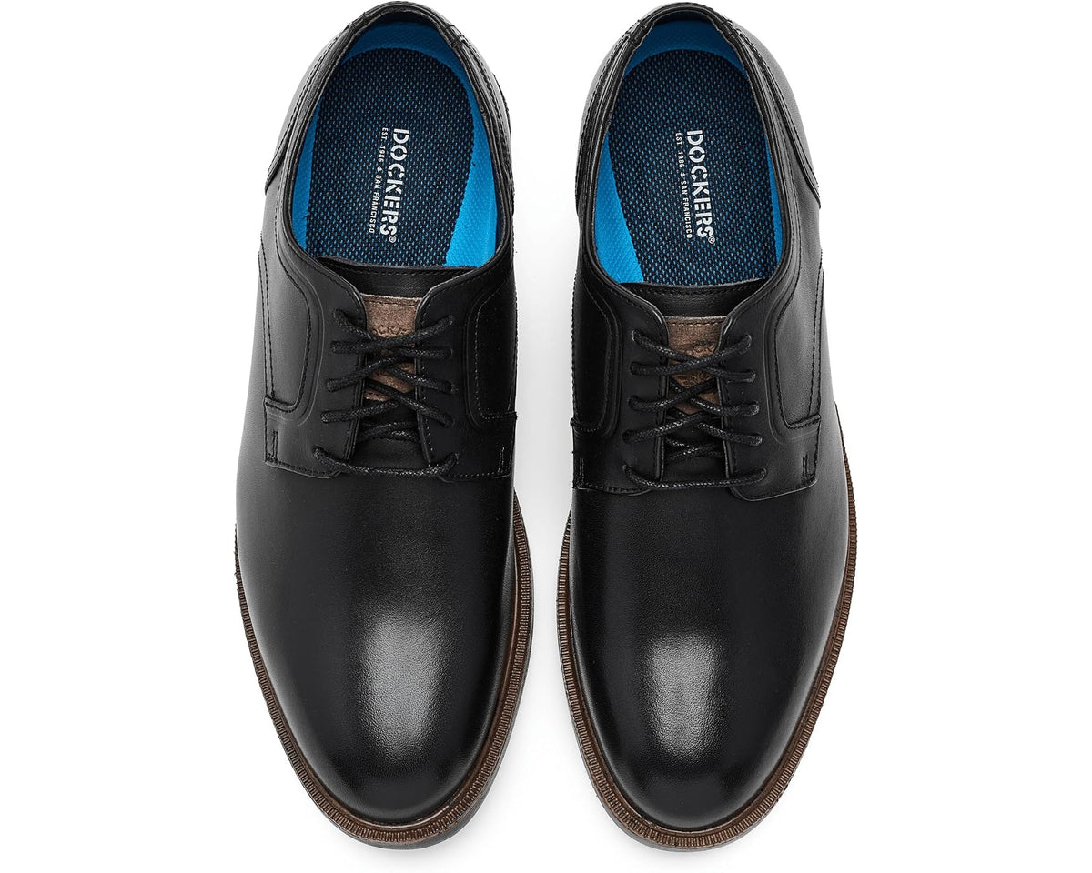 Pair of men's black lace-up dress shoes, blue insoles visible