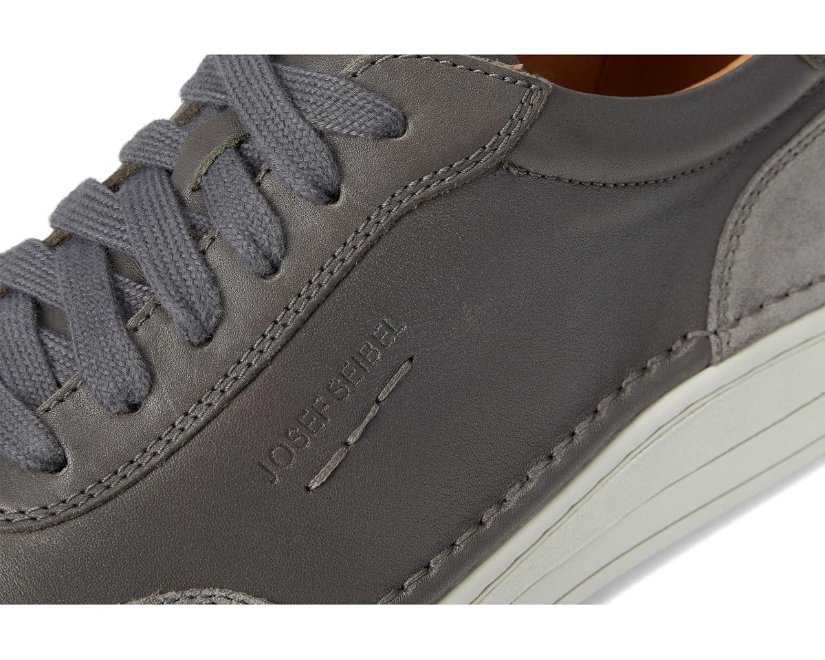 Josef Seibel sneakers in granite gray, stitched logo and gray lace close-up