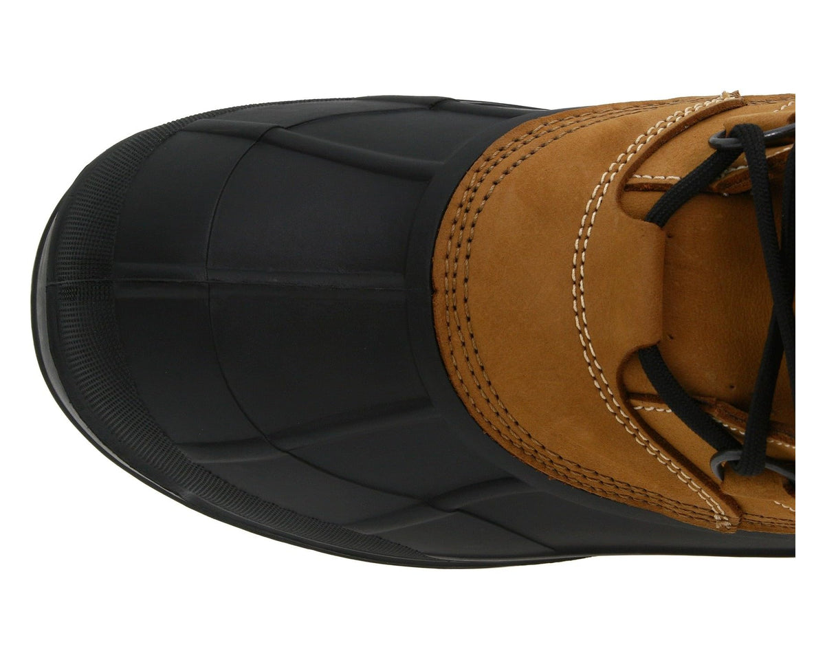 Tan suede boot toe with black rubber bumper and stitched trim