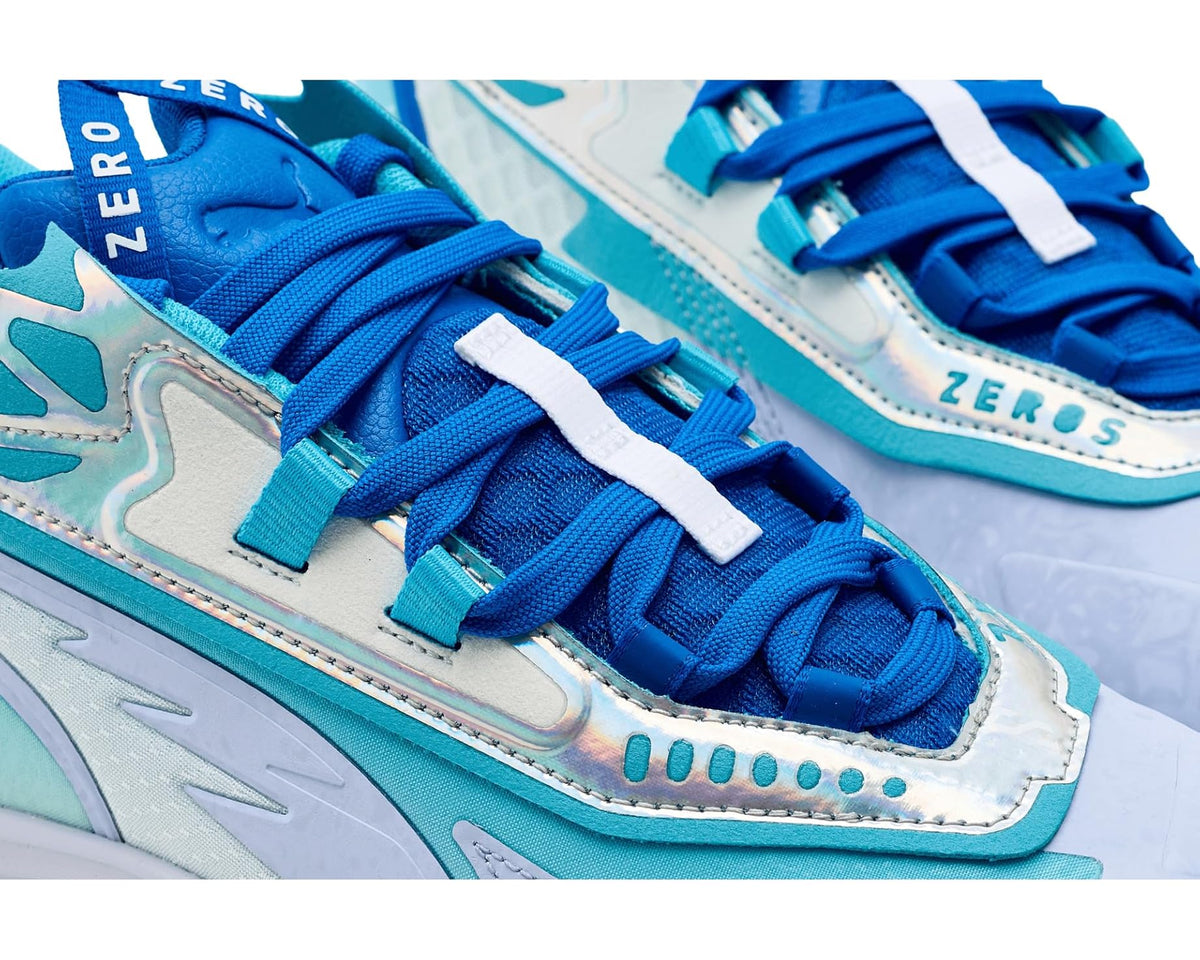 PUMA Scoot Zeros II close-up of blue laces and light aqua side trim