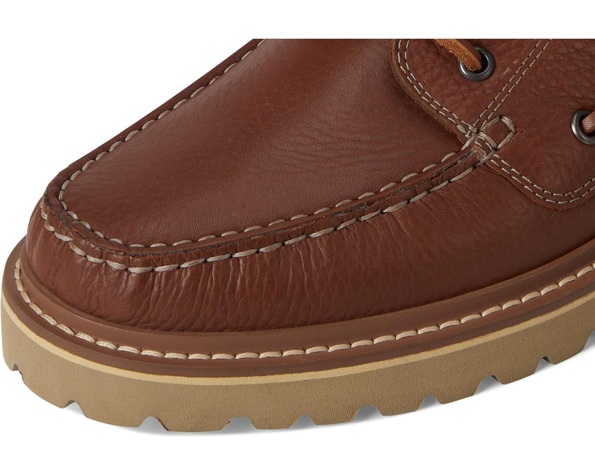 Men's brown leather boat shoe vamp detail with contrast stitching