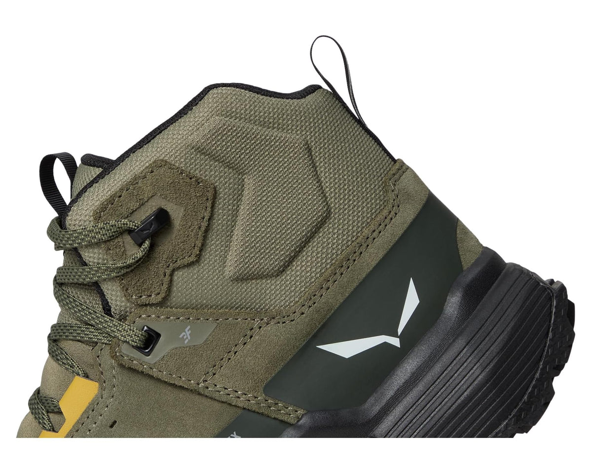 Men's mid-cut hiking boots, close-up on upper stitching, lace, and logo accents
